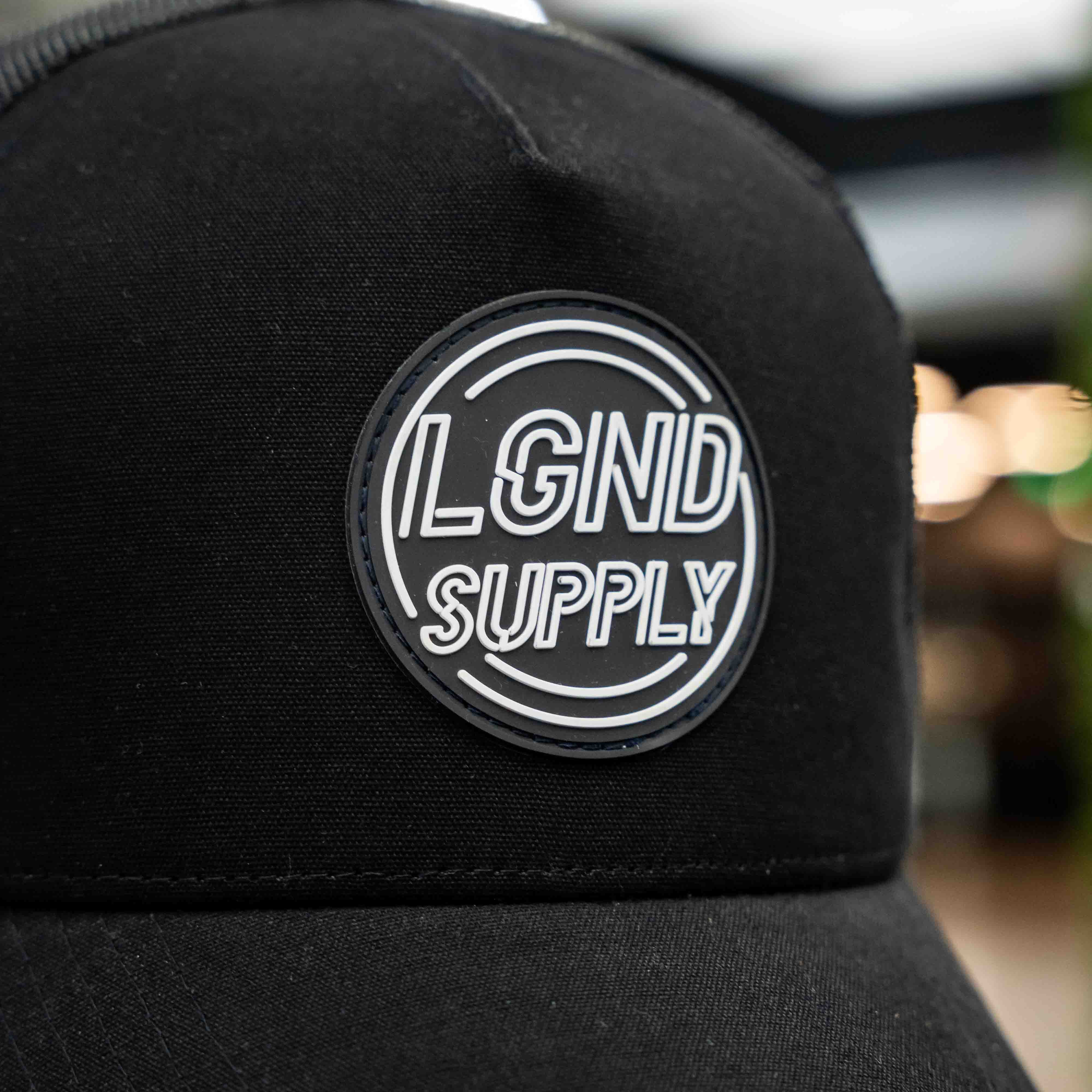 Midnight Badge Trucker Cap - Image 4