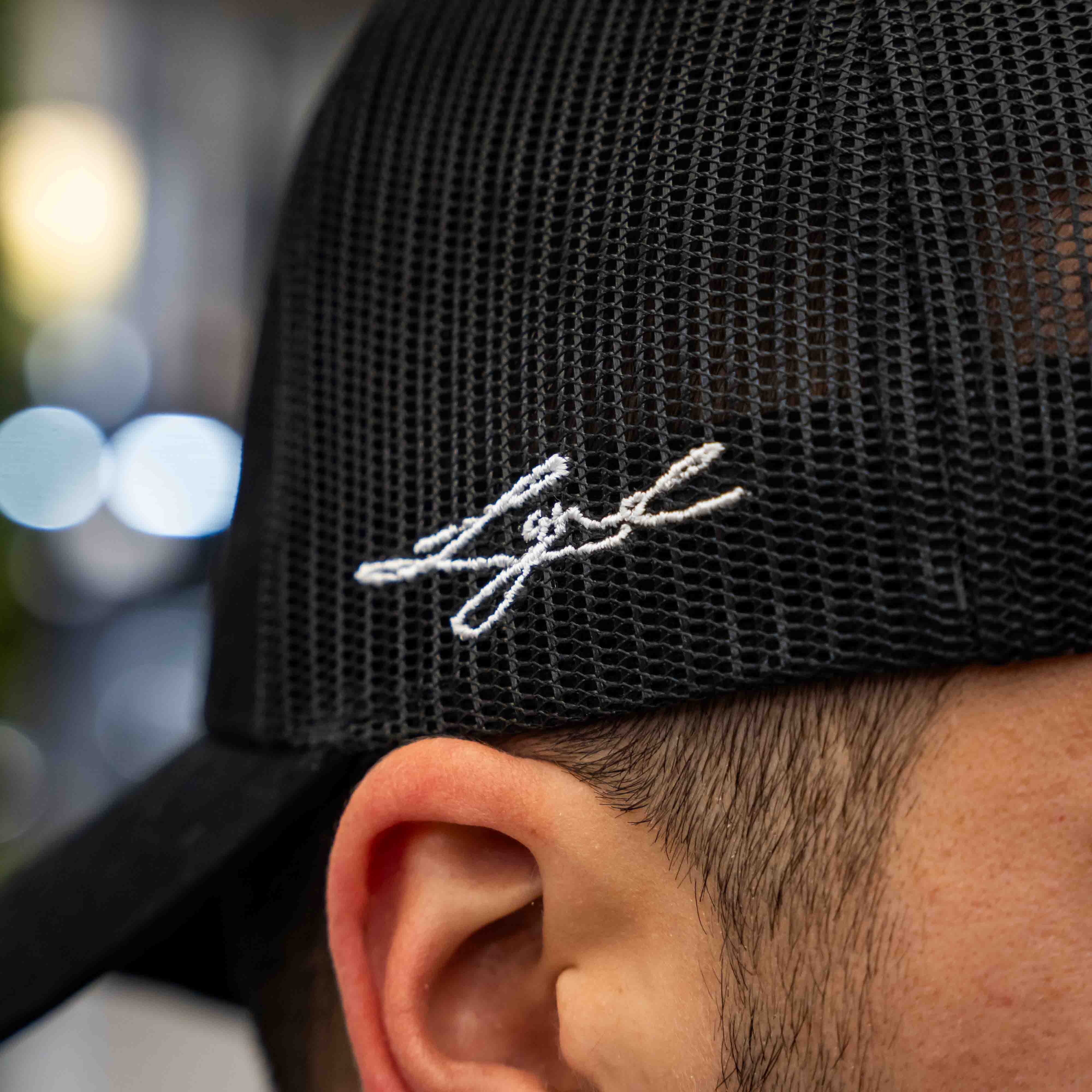 Midnight Badge Trucker Cap - Image 5