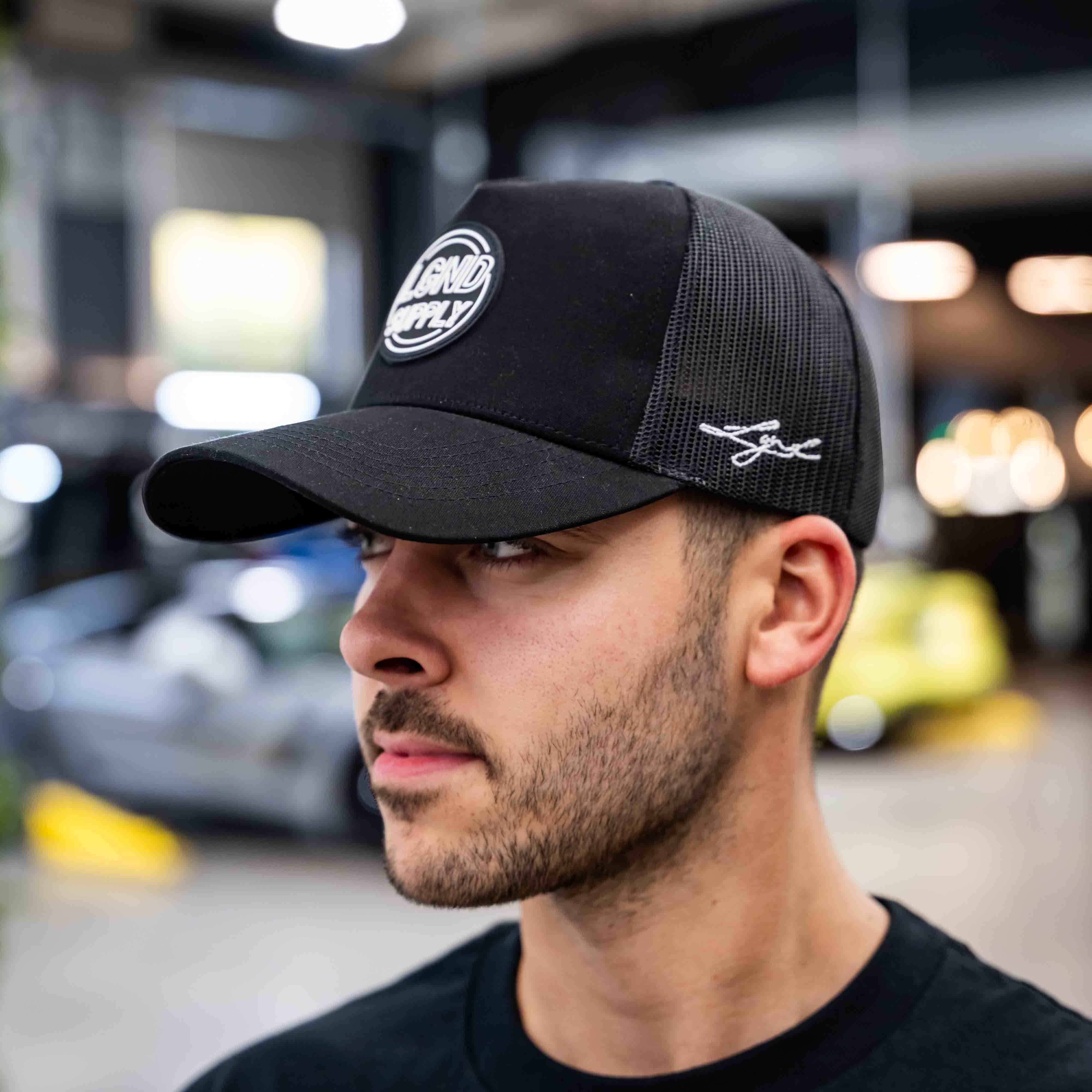 Midnight Badge Trucker Cap - Image 6